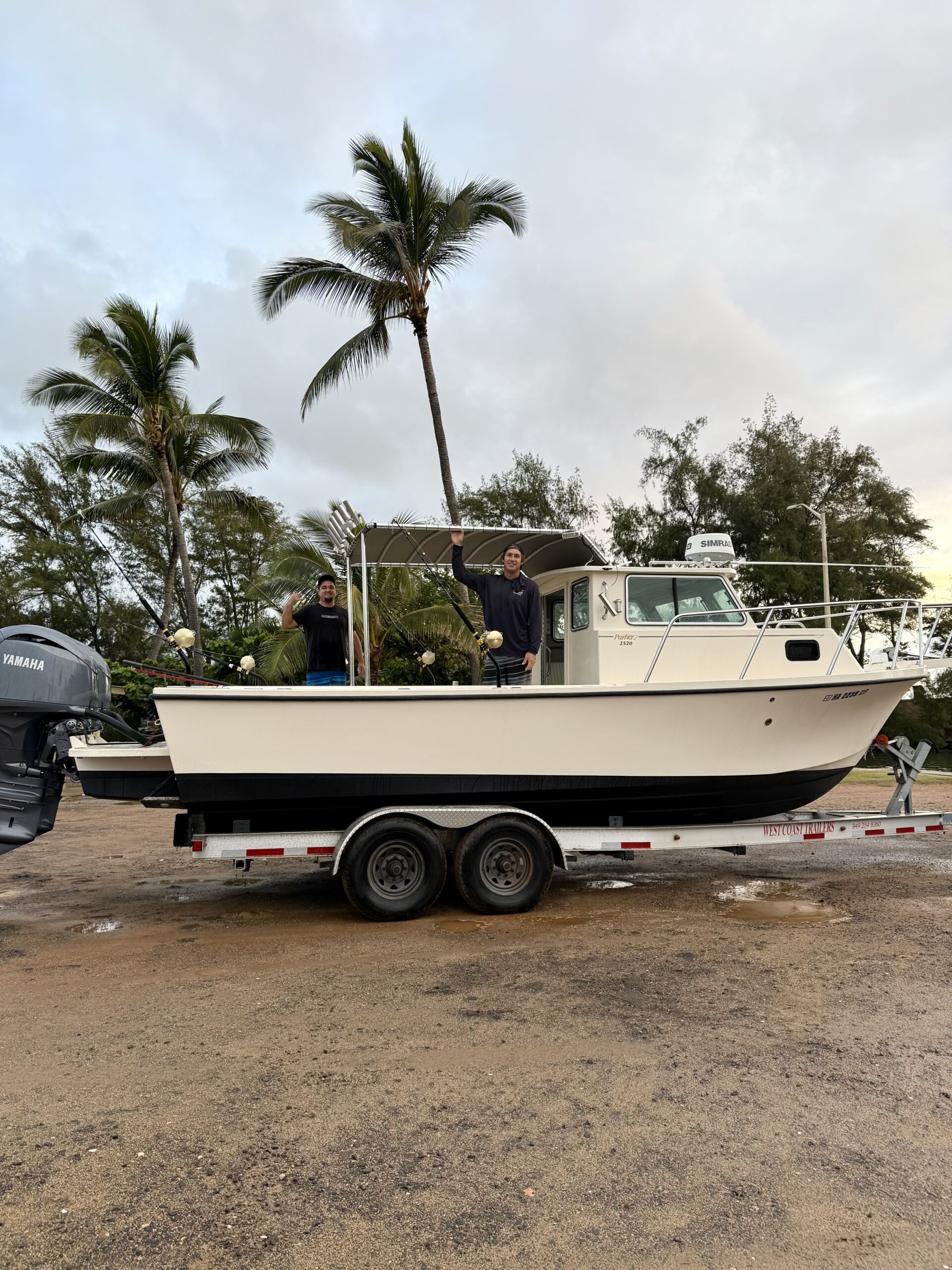 Capt. Austin standing on Aloha Kauai Sportfishing's boat "Malolo"